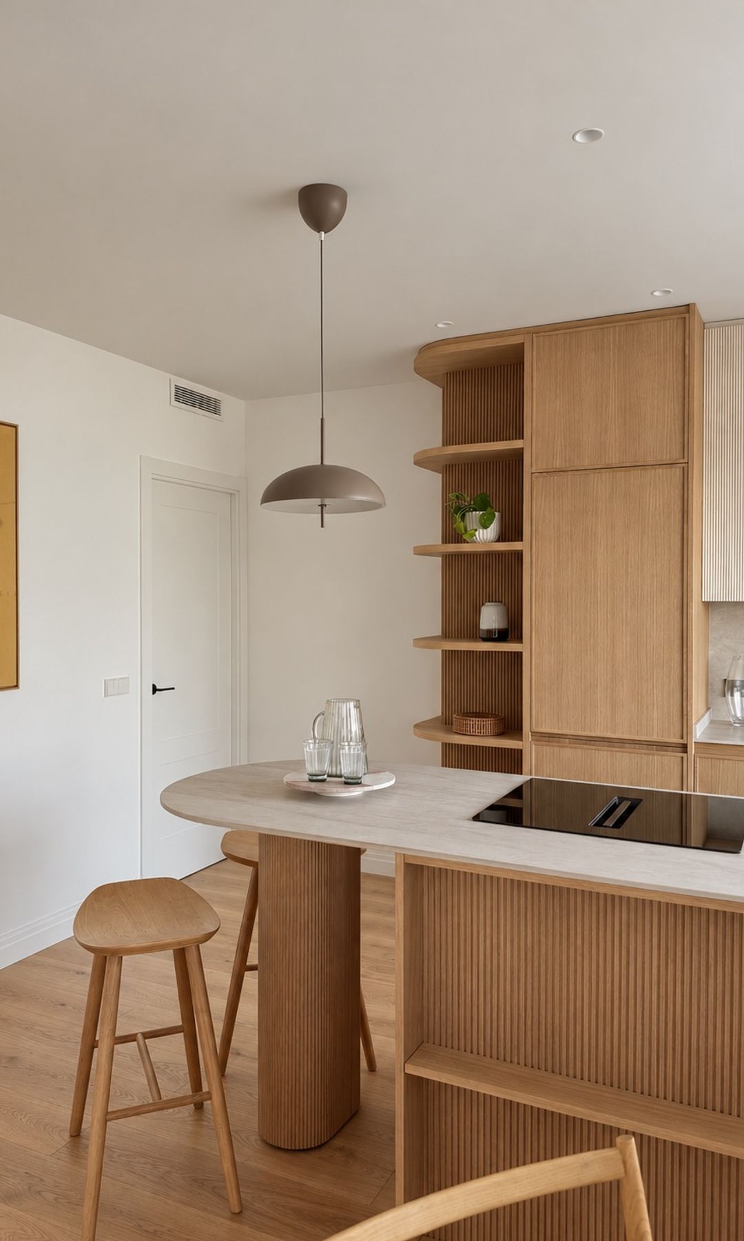 Mini comedor en una isla de la cocina, proyecto de Mónica Diago Arquitectura
