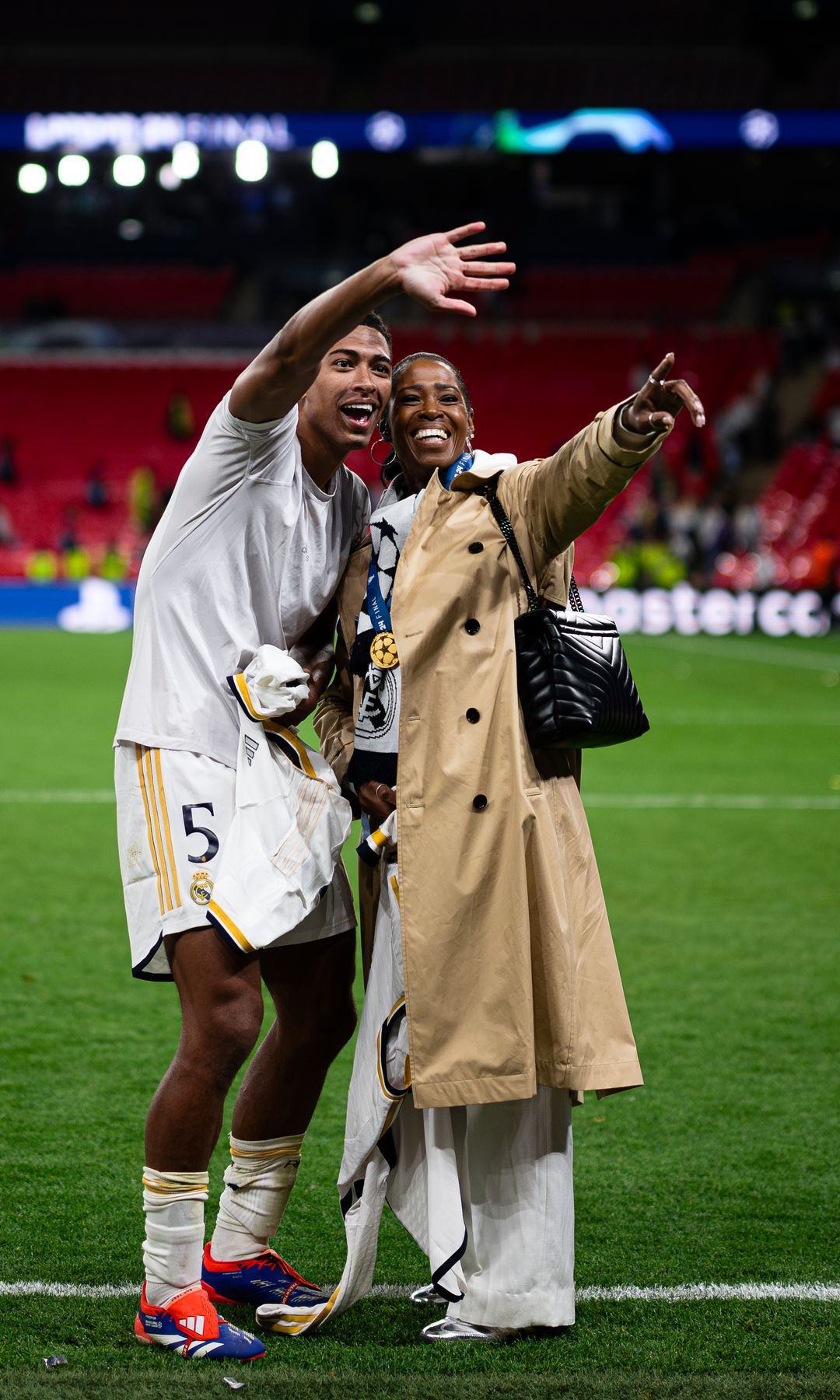WEMBLEY STADIUM, LONDON, UNITED KINGDOM - 2024/06/01: Jude Bellingham (L) of Real Madrid CF and his mother Denise Bellingham gesture during the award ceremony following the UEFA Champions League final football match between Borussia Dortmund and Real Madrid CF. Real Madrid CF won 2-0 over Borussia Dortmund. (Photo by NicolÃ² Campo/LightRocket via Getty Images)