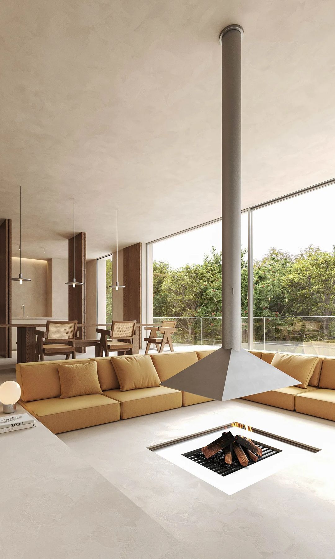 Salón comedor con chimenea enterrada en el suelo, sofás amarillo mostaza, comedor de madera con sillas de rejilla 