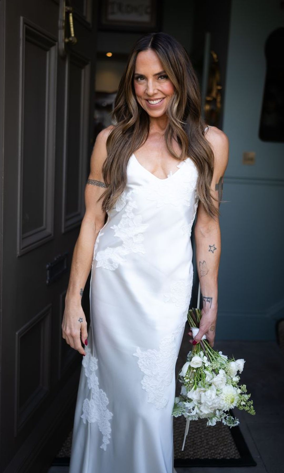 Mel C, con vestido de Victoria Beckham, durante su boda con Chris Dingwall
