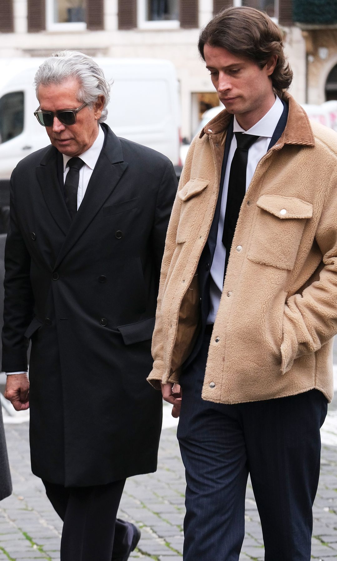 Carlos Souza, gran amigo de Valentino, con uno de sus hijos 