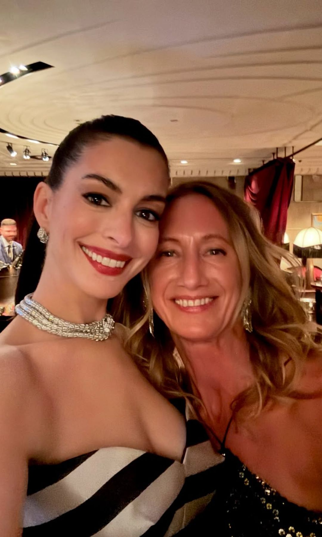 Anne Hathaway y su entrenadora