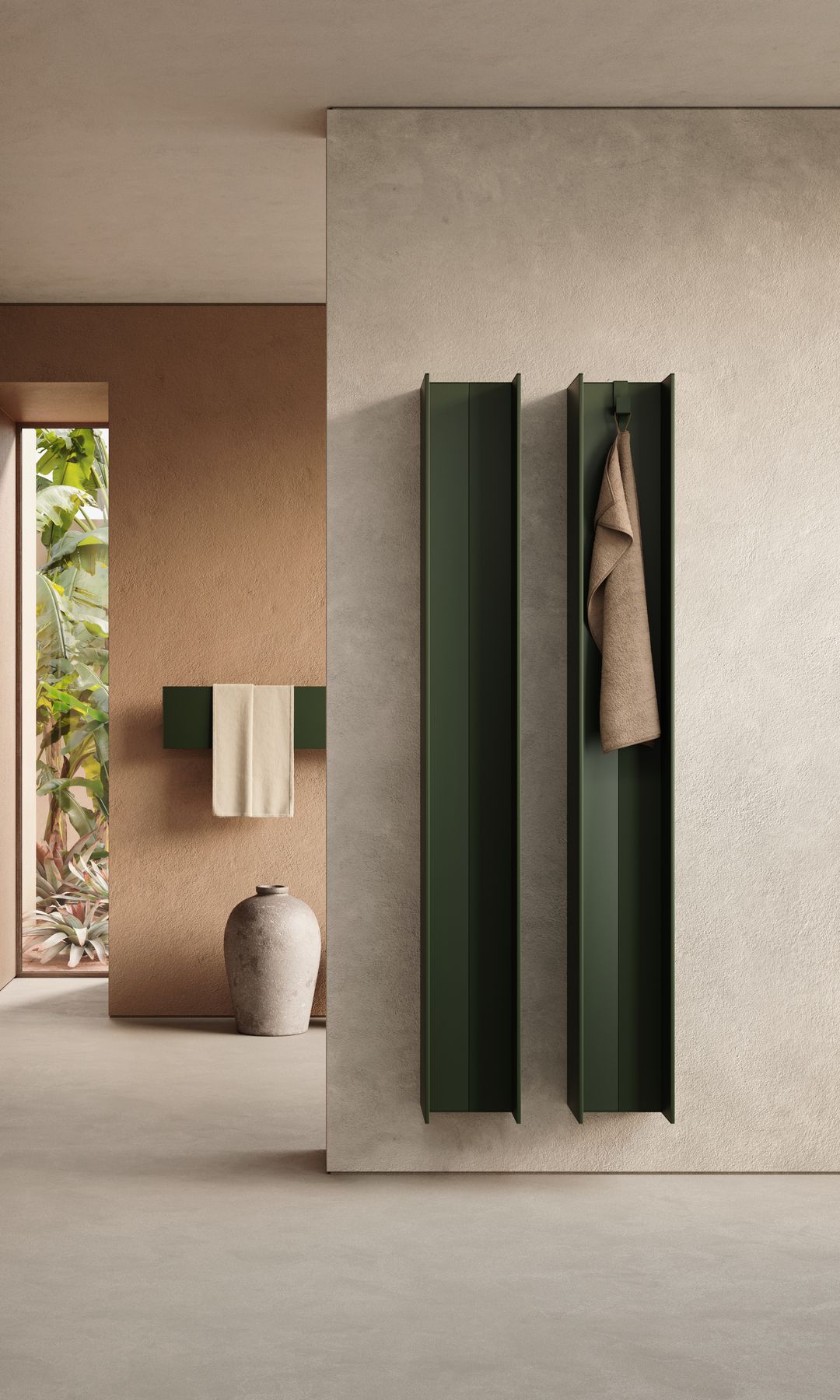 Baño con radiadores verdes oscuros con toallero, estantería de obra
