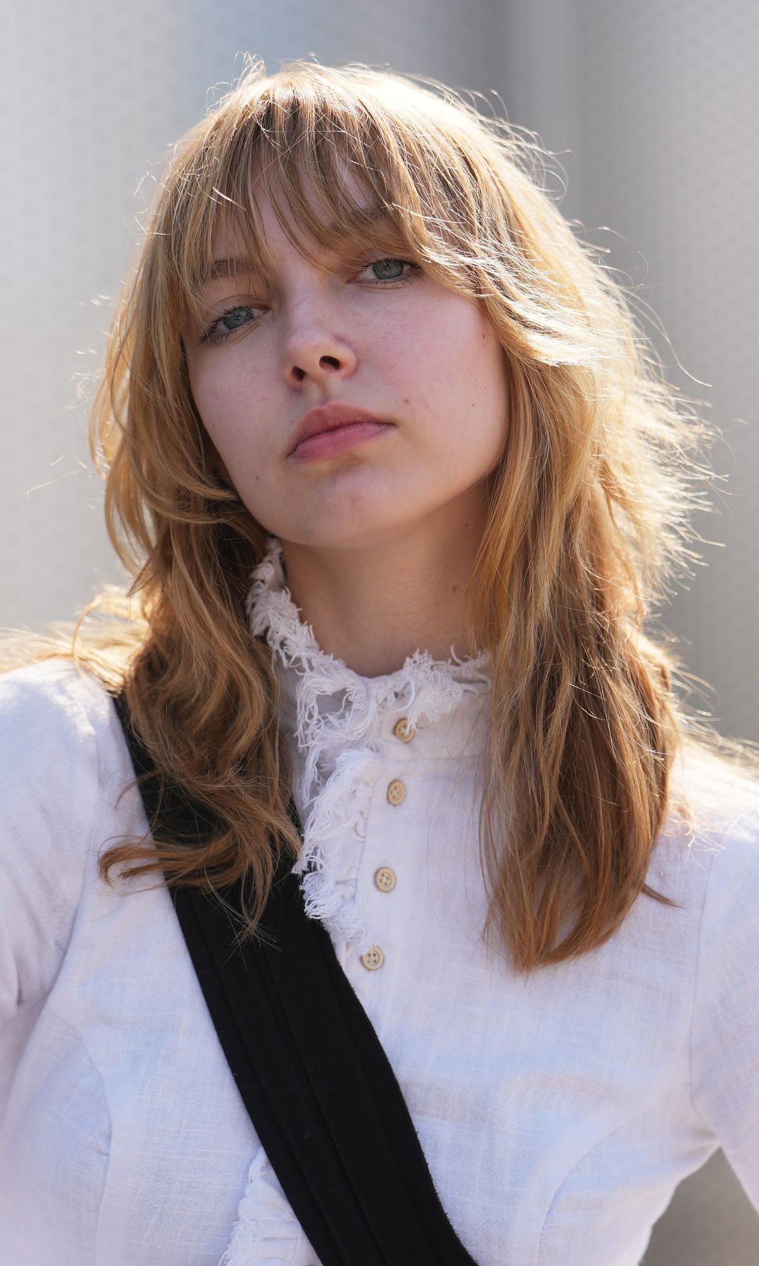  Corte de pelo capeado y con flequillo de mujer