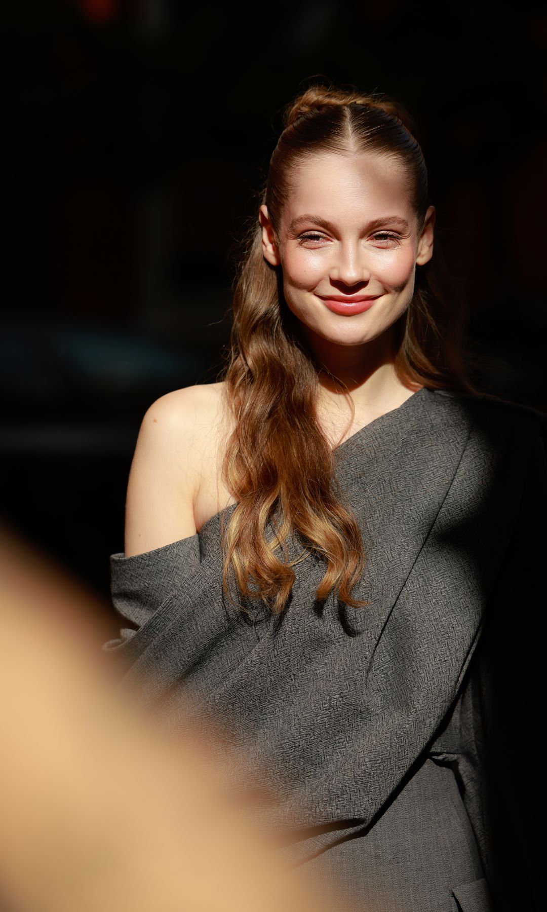 LONDON, ENGLAND - SEPTEMBER 21: Hannah Dodd wearing grey off shoulder top, pants and black heels outside Erdem during London Fashion Week on September 21, 2025 in London, England.  (Photo by Hanna Lassen/Getty Images)