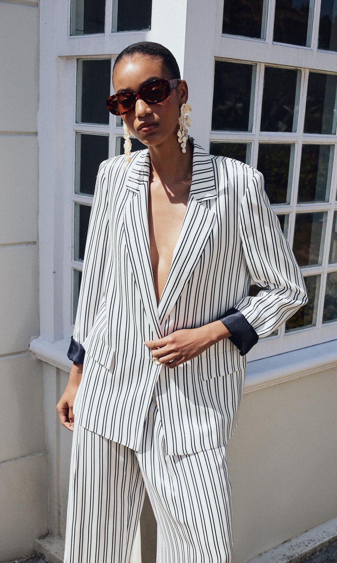 Blazer rayas puño remangado (39,95 euros)