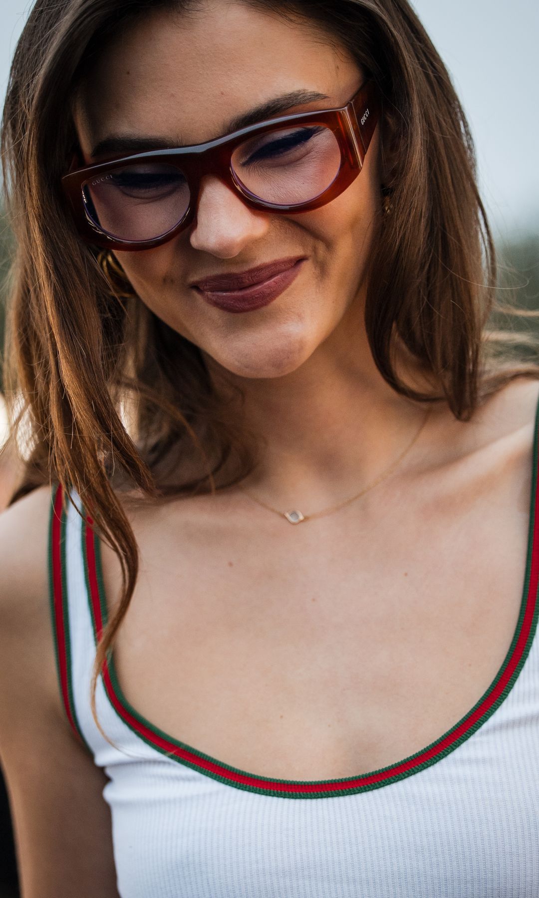 MILAN, ITALY - FEBRUARY 25: Stefanie Giesinger is seen wearing white tank top and glasses outside Gucci during the Milan Fashion Week Womenswear Fall/Winter 2025/2026 on February 25, 2025 in Milan, Italy