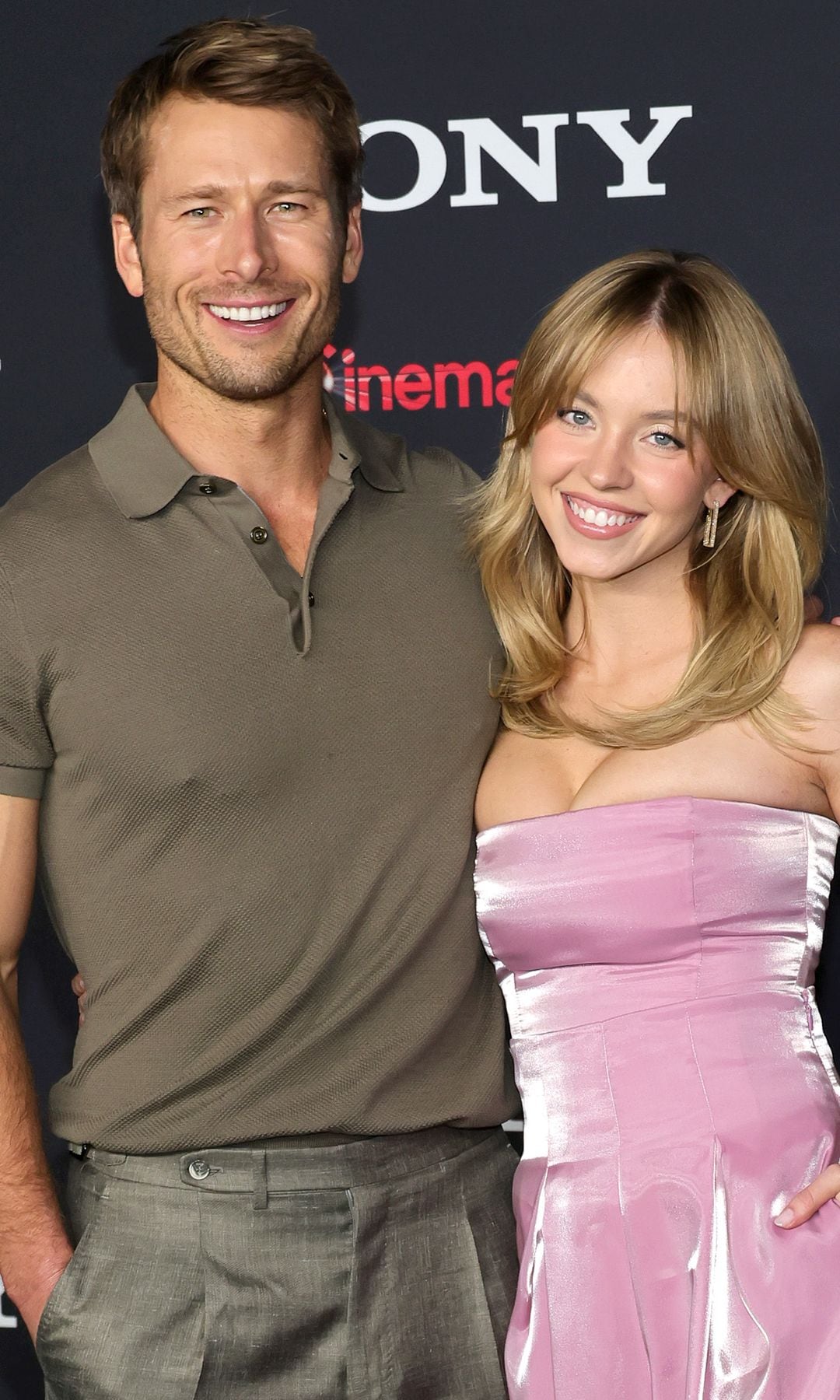 LAS VEGAS, NEVADA - APRIL 24: (L-R) Glen Powell and Sydney Sweeney pose for photos as they promote the upcoming film "Anyone But You" at the Sony Pictures Entertainment presentation during CinemaCon, the official convention of the National Association of Theatre Owners, at The Colosseum at Caesars Palace on April 24, 2023 in Las Vegas, Nevada. (Photo by Ethan Miller/Getty Images)