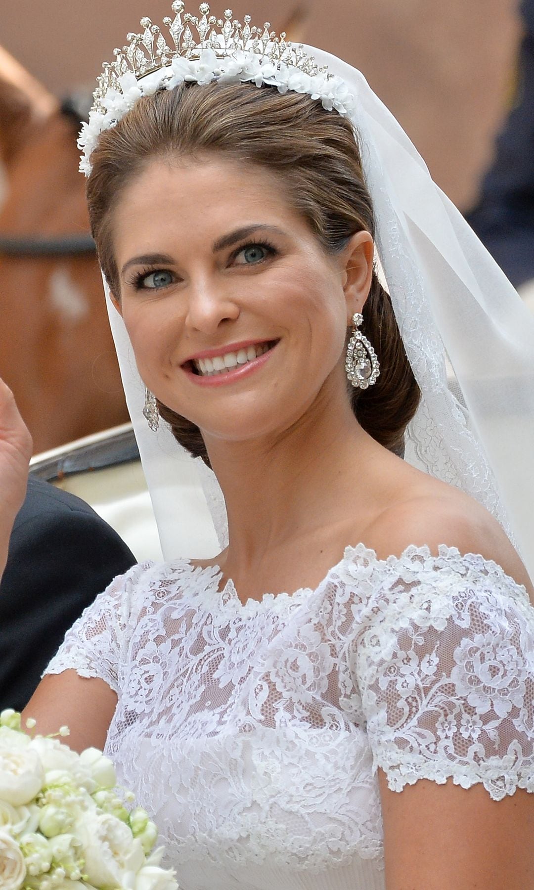 STOCKHOLM, SWEDEN - JUNE 08:  Christopher O'Neill and Princess Madeleine of Sweden are taken by horse and carriage from the Royal Palace of Stockholm to Riddarholmen after the wedding of Princess Madeleine of Sweden and Christopher O'Neill hosted by King Carl Gustaf XIV and Queen Silvia at The Royal Palace on June 8, 2013 in Stockholm, Sweden.  (Photo by Torsten Laursen/Getty Images)