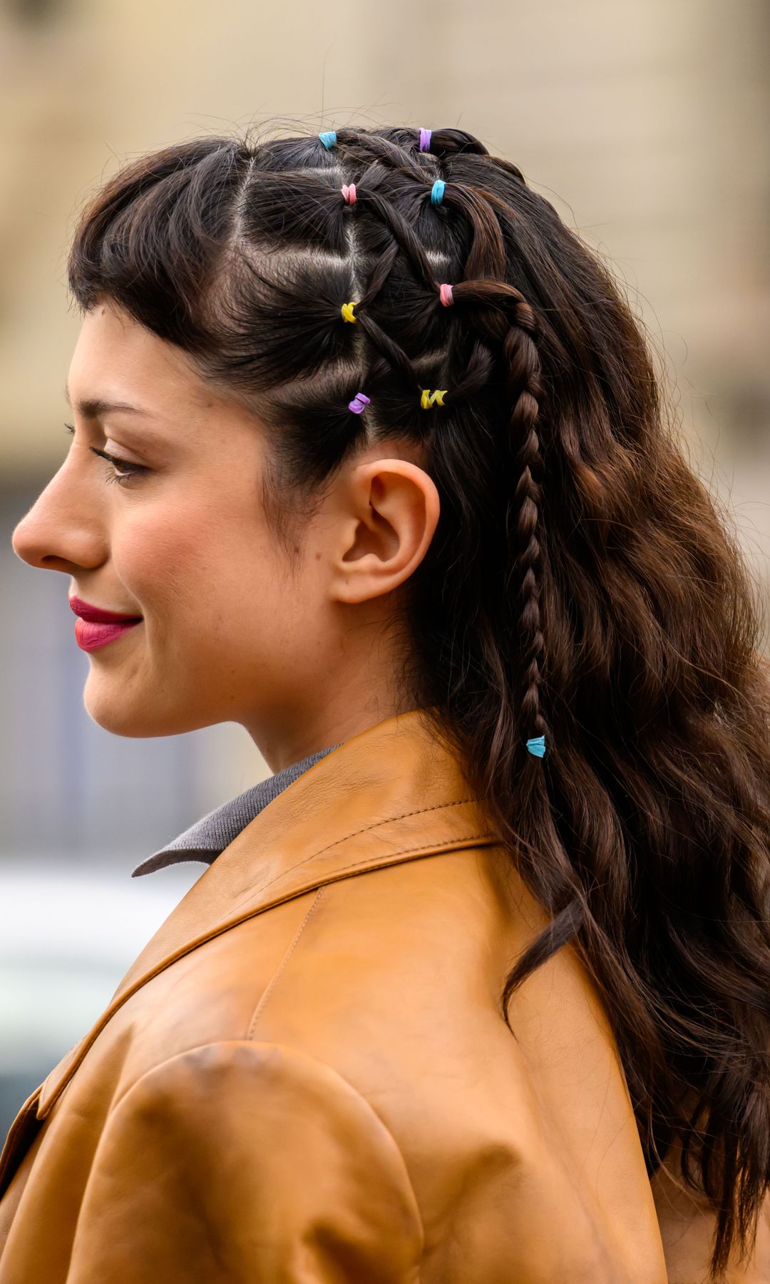 PARIS, FRANCE - MARCH 10: Maria Bottle wearing Miu Miu with plaits and coloured hairbands in her hair outside the Miu Miu show during Day Nine of Paris Fashion Week - Womenswear Fall/Winter 2026/2027 on March 10, 2026 in Paris, France