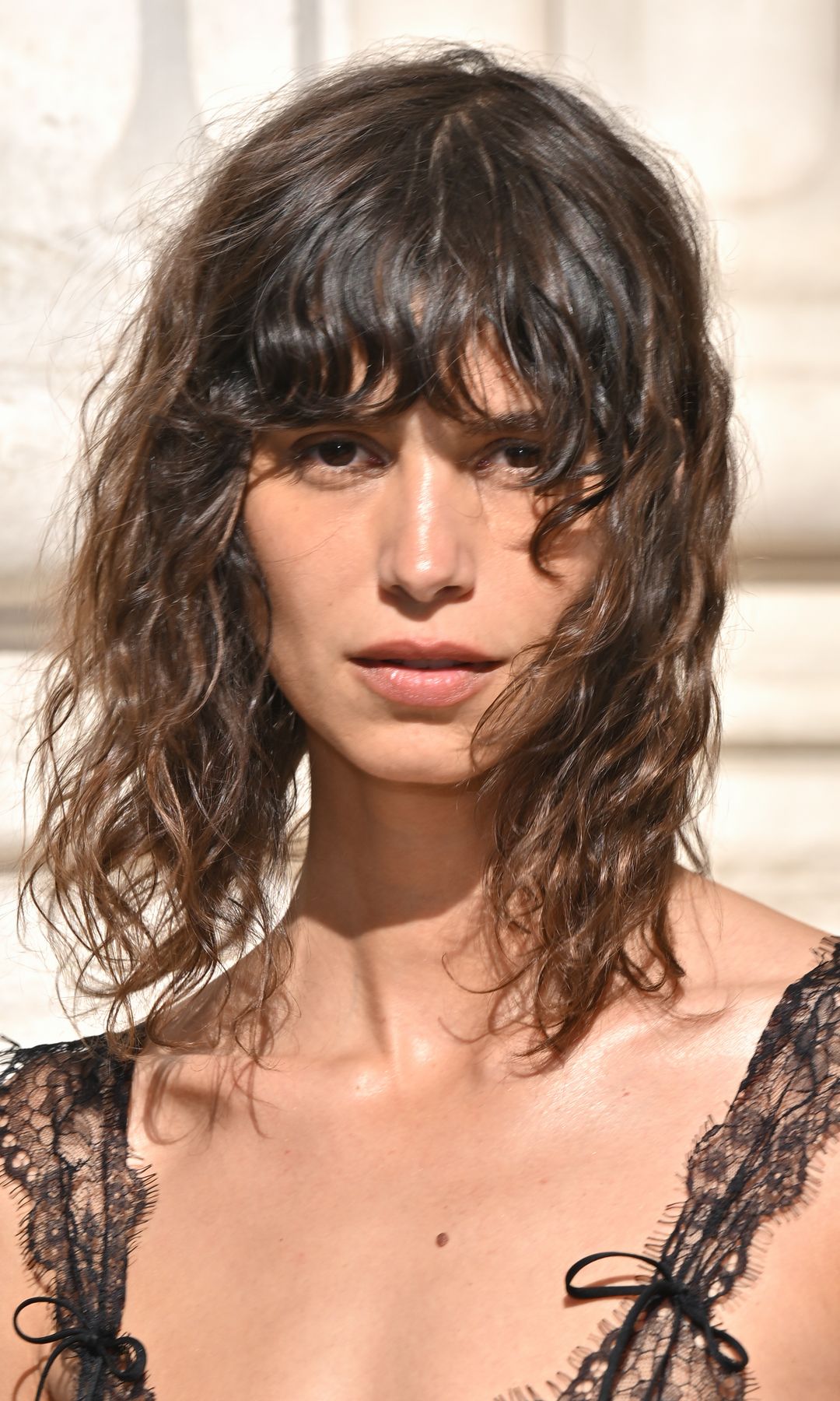 PARIS, FRANCE - JUNE 24: (EDITORIAL USE ONLY - For Non-Editorial use please seek approval from Fashion House) Mica Arganaraz attends the Saint Laurent Menswear Spring/Summer 2026 show as part of Paris Fashion Week on June 24, 2025 in Paris, France