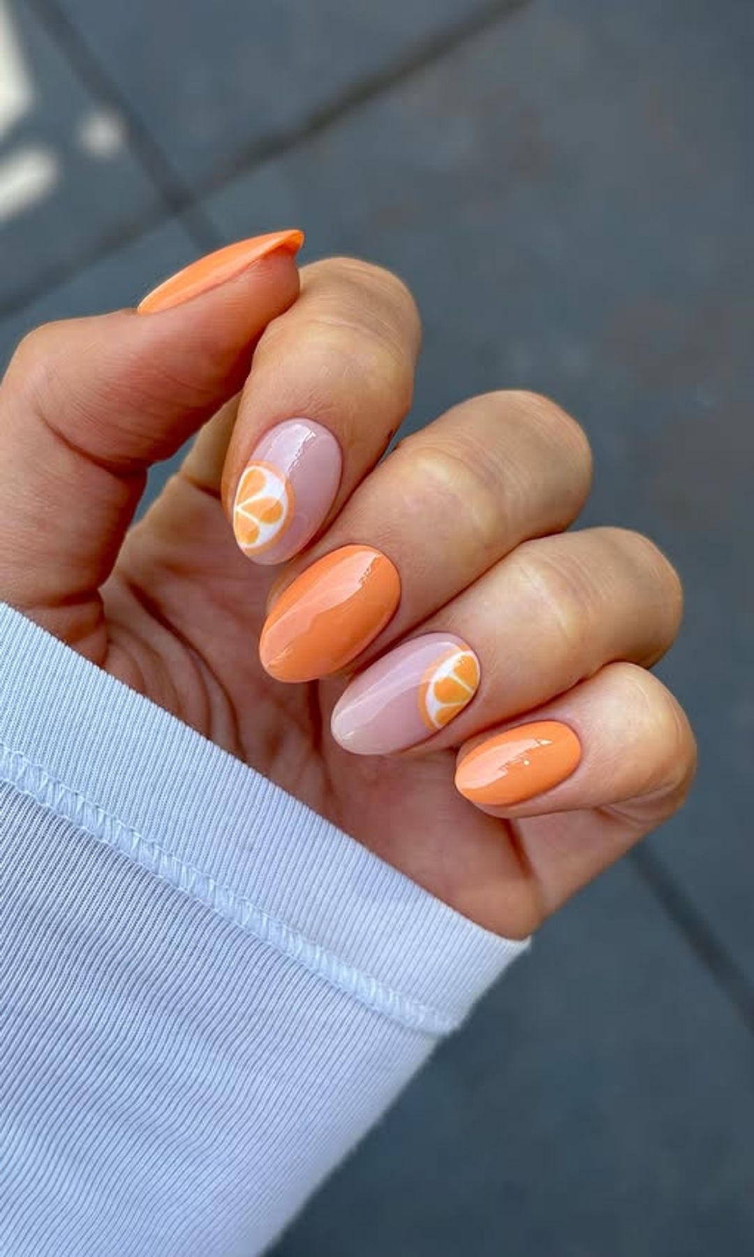 Manicuras con naranja fruta