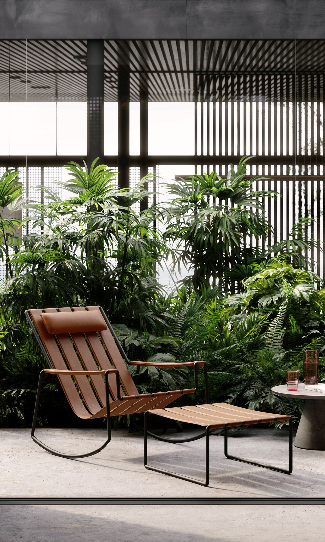 Mecedora con puf a juego en un jardín interior 