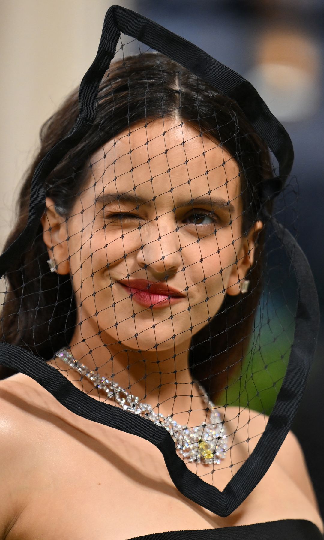 TOPSHOT - Spanish singer Rosalia arrives for the 2024 Met Gala at the Metropolitan Museum of Art on May 6, 2024, in New York. The Gala raises money for the Metropolitan Museum of Art's Costume Institute. The Gala's 2024 theme is "Sleeping Beauties: Reawakening Fashion.