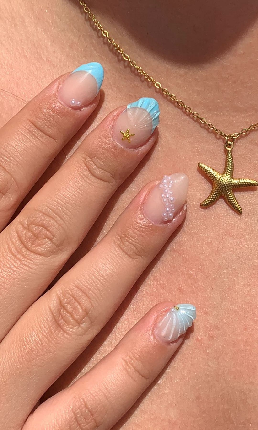 Manicura de conchas de mar