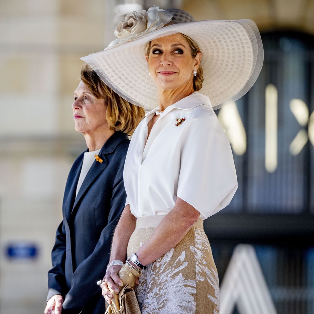 Máxima de Holanda, junto a Elke Büdenbender, deslumbra con un espectacular look de primavera: pamela XL y flores que acaparan todas las miradas