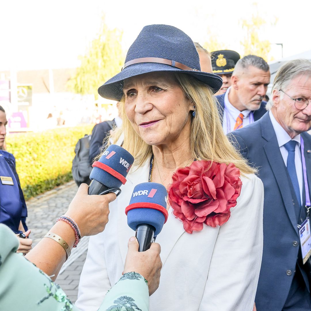 La infanta Elena acapara todas las miradas en Alemania con un inesperado guiño a su juventud en su cita con Amalia de Holanda y Mary de Dinamarca