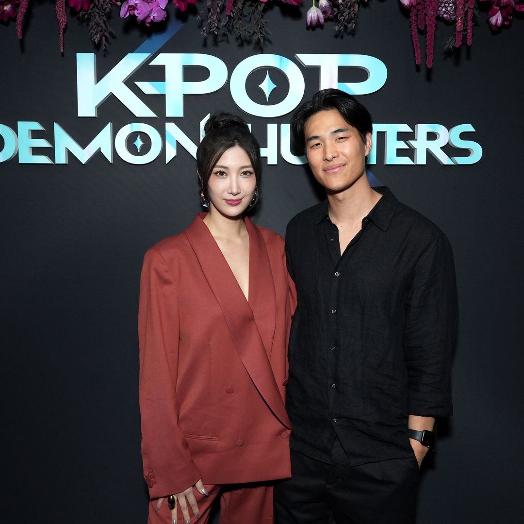 Ejae y Sam Kim en un evento de promoción K-Pop Demon Hunters