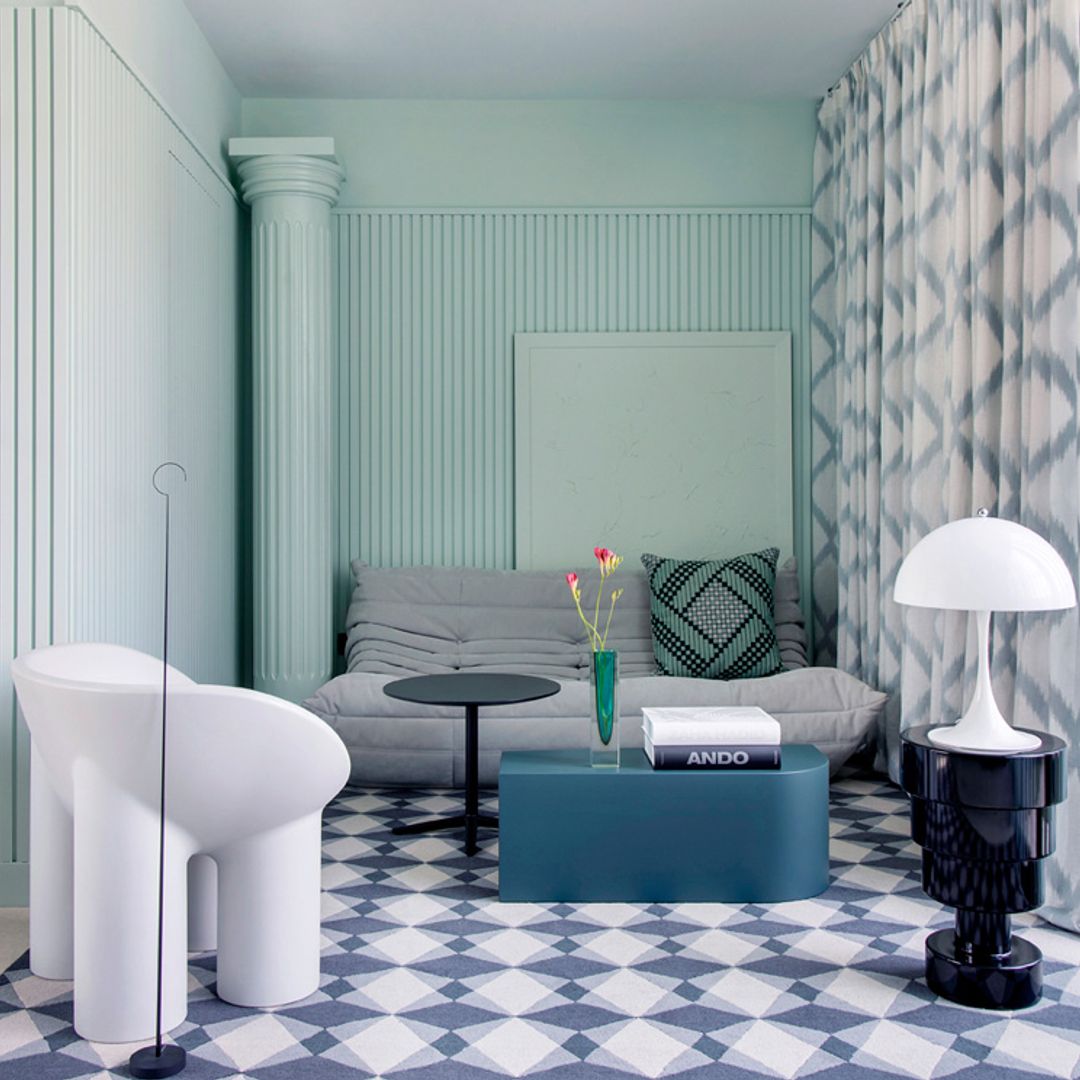 Un elegante piso en Valencia repleto de muebles y luminarias iconos del diseño