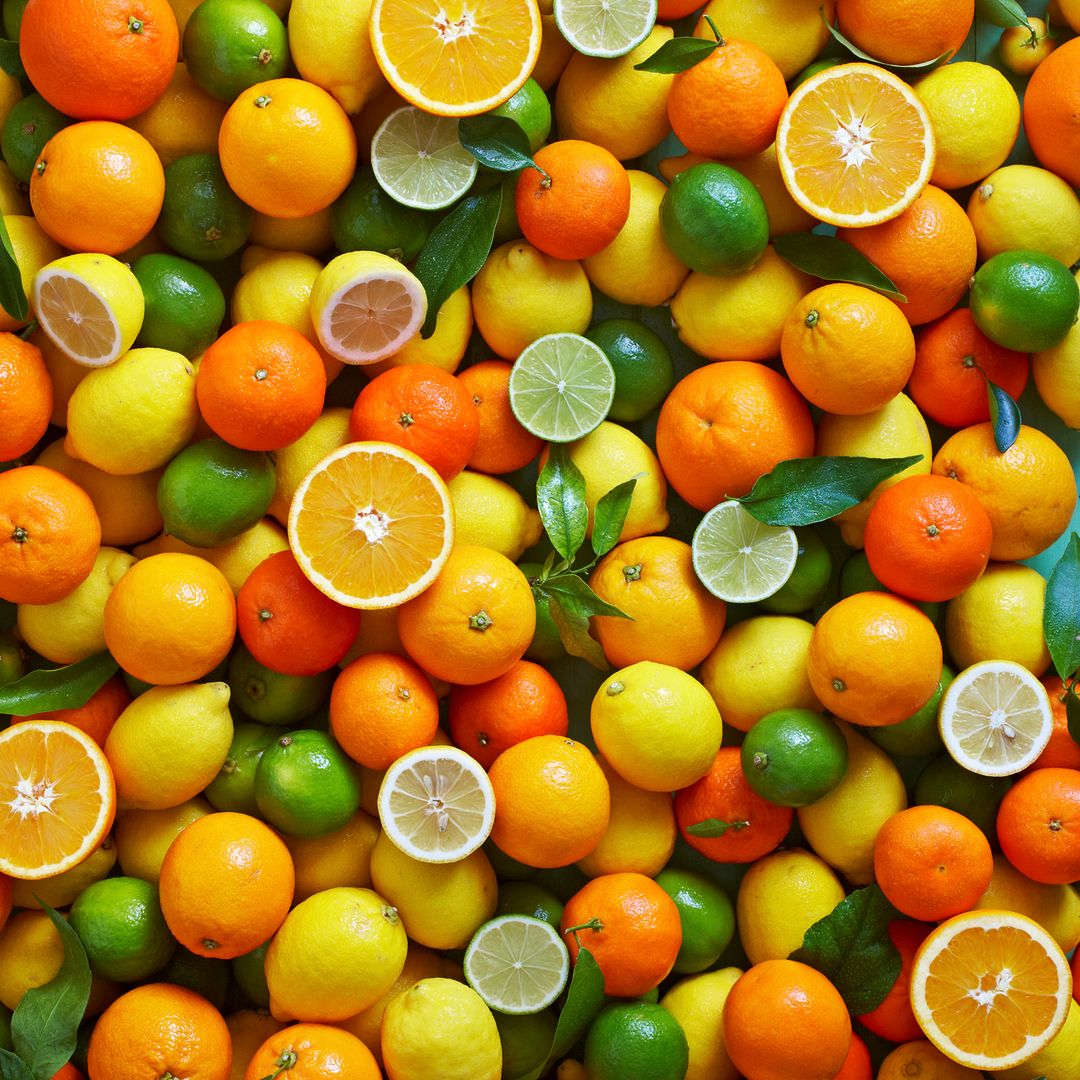 Conjunto de naranjas y otras frutas cítricas