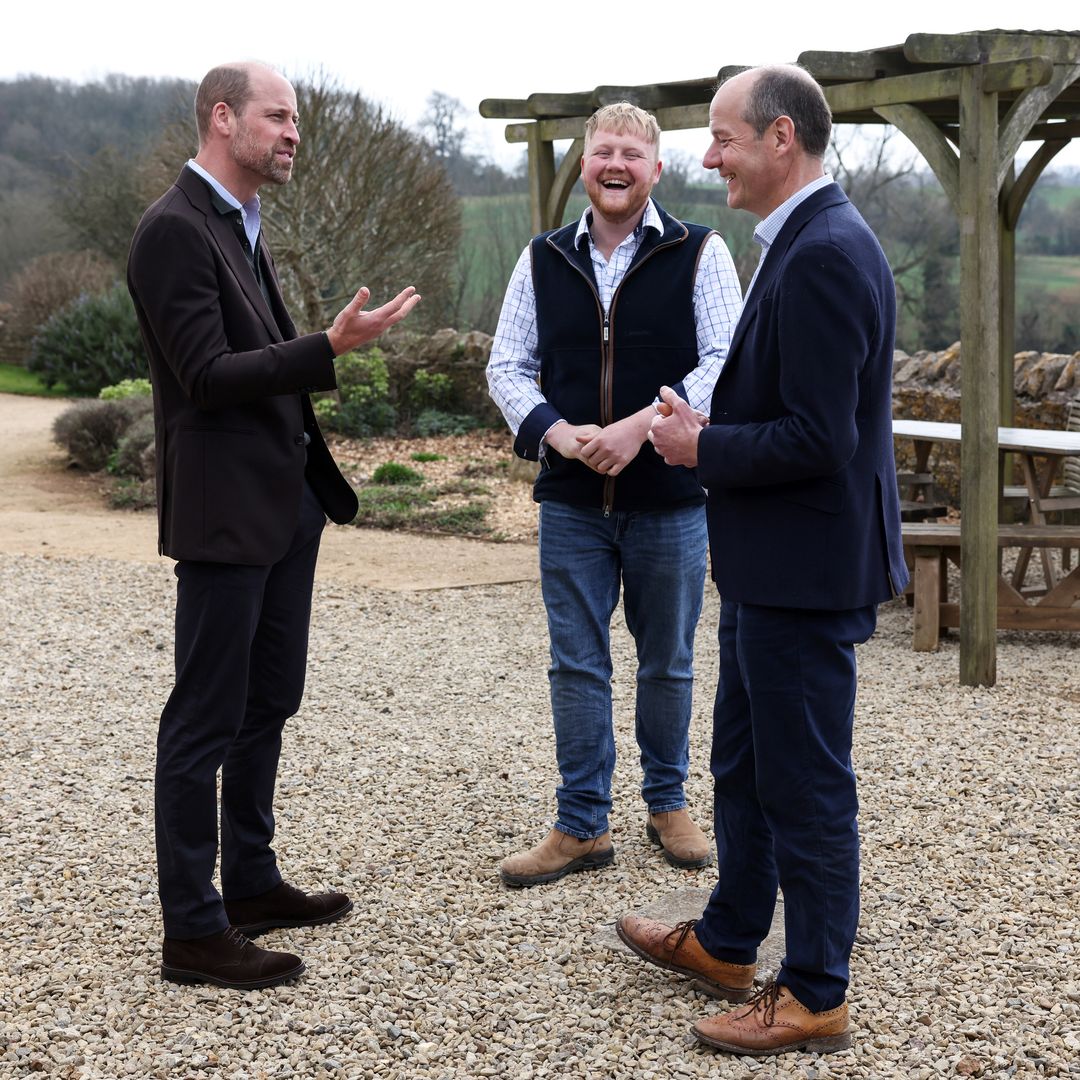 Prince William, Prince of Wales (L) speaks with Clarkson's Farm stars Kaleb Cooper (C) and Charlie Ireland (R) during an event for sixty of the Duchy of Cornwall's next generation of farming tenants, on March 26, 2025 in Pensford, England