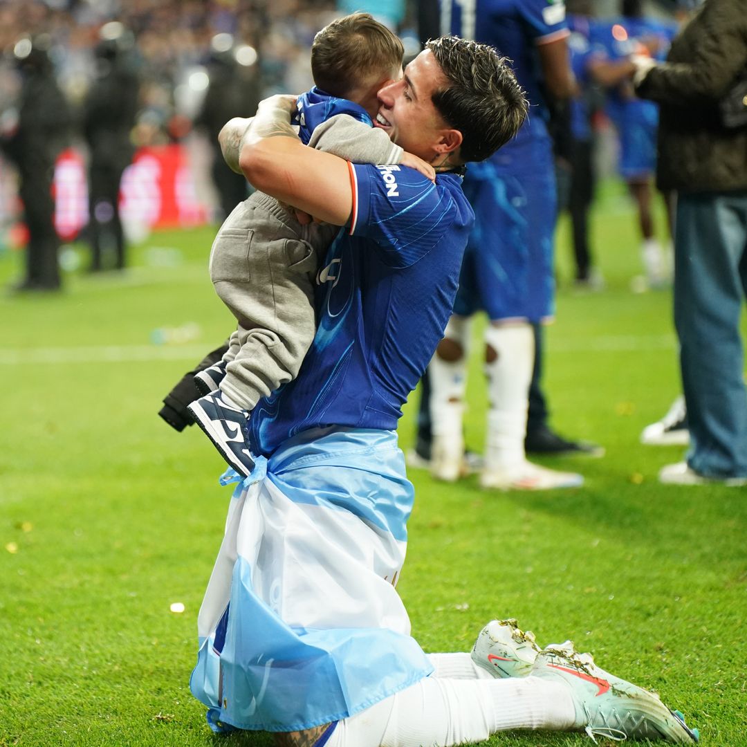WROCLAW, POLAND - MAY 28: Enzo Fernandez of Chelsea F.C. celebrates with his family after winning the UEFA Conference League final match between Real Betis Balompie and Chelsea F.C. at Tarczynski Arena Wroclaw on May 28, 2025 in Wroclaw, Poland. (Photo by Alexandra Fechete/MB Media/Getty Images)