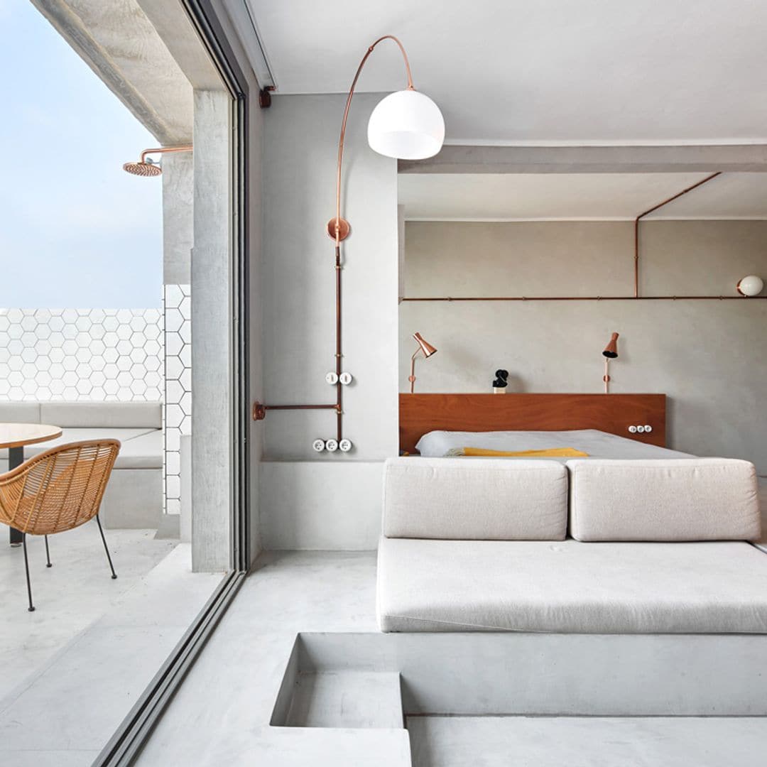 Cómo conseguir ambientes de estilo industrial cálidos y muy hogareños