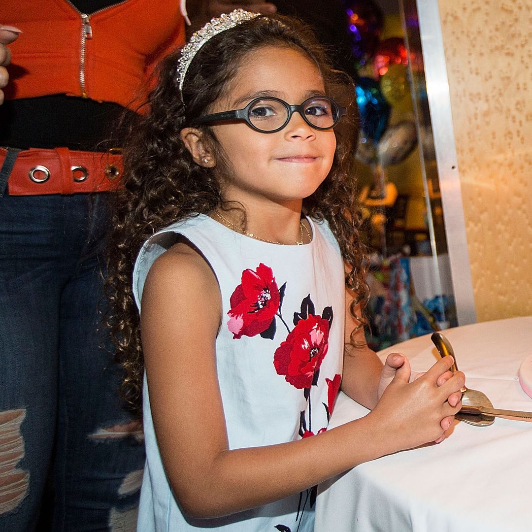 ANAHEIM, CA - APRIL 30:  Monroe Cannon poses next to her birthday cake at Disneyland on April 30, 2017 in Anaheim, California.  (Photo by FilmMagic/FilmMagic)