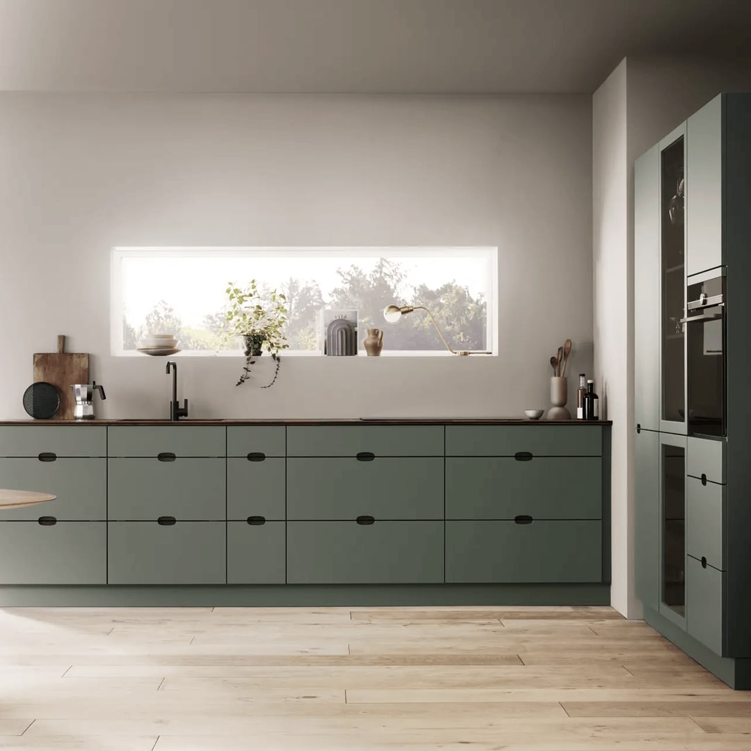 Cocina con muebles en verde