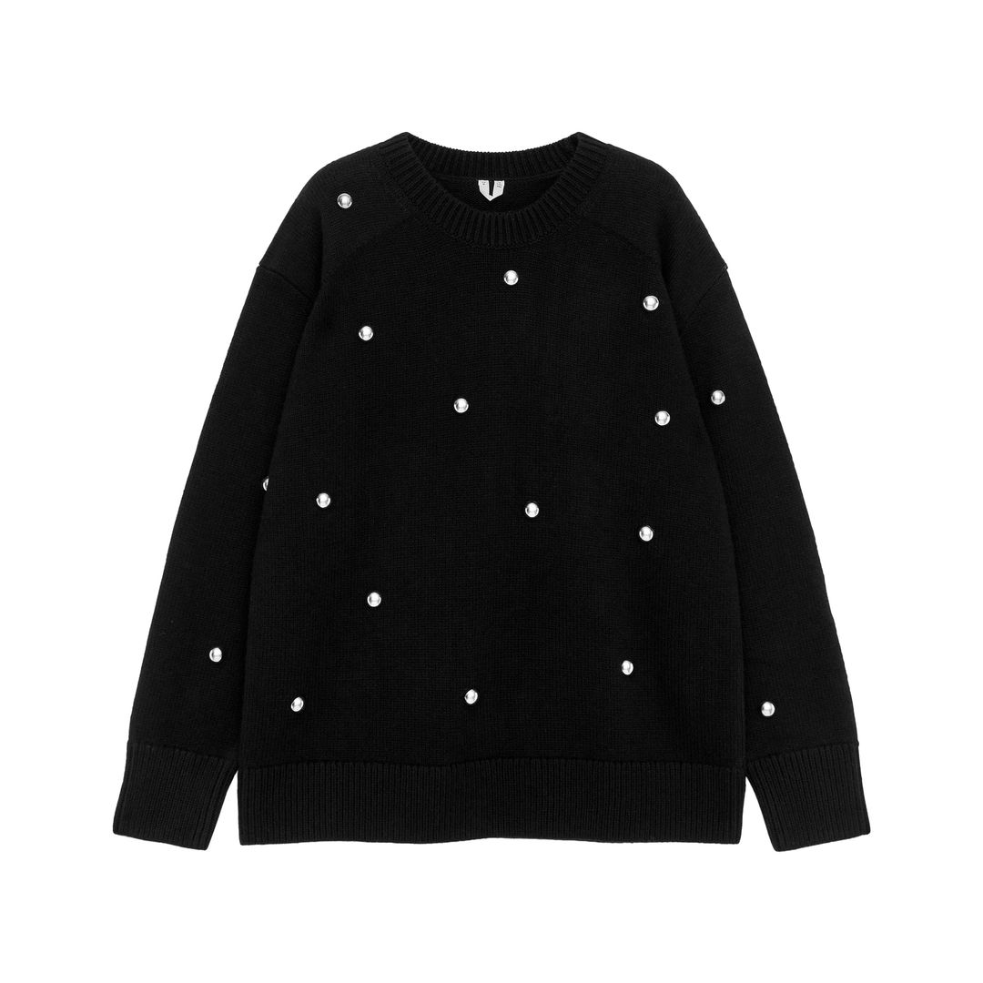 Jersey con tachuelas (99 €), de Arket