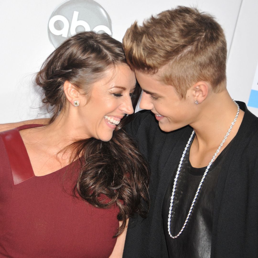 Singer Justin Bieber and his mother Pattie Mallette arrive the 40th American Music Awards held at Nokia Theatre L.A. Live. (Photo by Frank Trapper/Corbis via Getty Images)