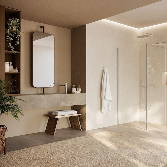 Baño con gran ventanal, ducha Xl con mampara de cristal con perfiles metálicos, encimera de obra espejo en vertical, taburete, estantería de madera y alfombra vegetal