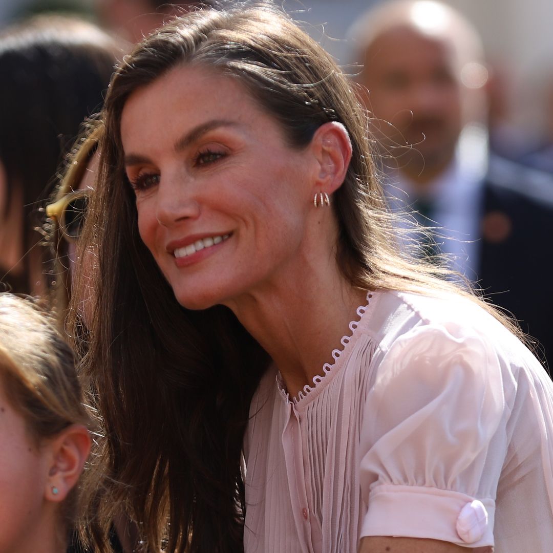 La reina Letizia, tras visitar Ceuta, cambia de look en Melilla con una blusa romántica de hace 10 años: de manga corta y original cuello