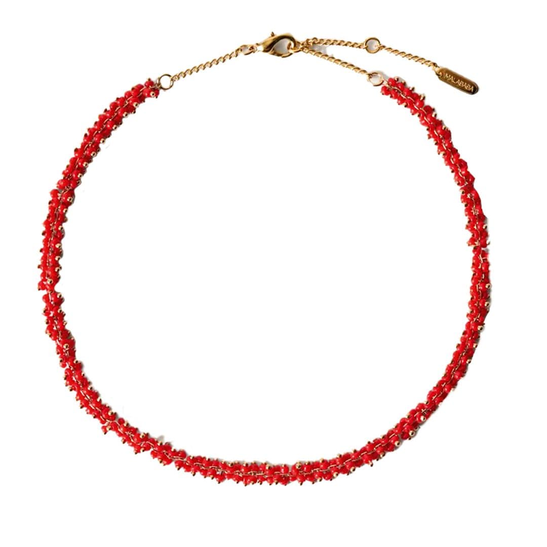 Collar corto de bolas (110 €), de Malababa