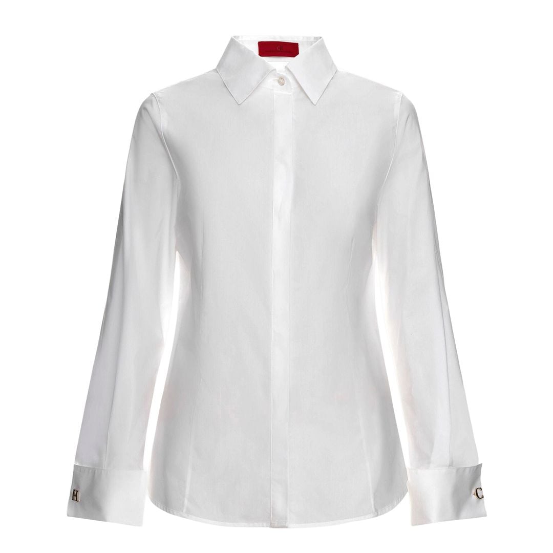 Camisa blanca (270 €), de Carolina Herrera