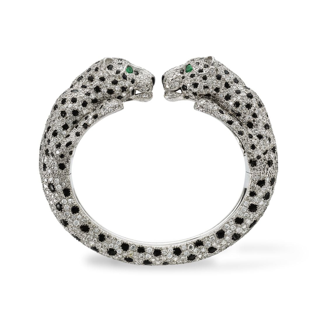 Brazalete Panthère con diamantes, esmeralda y ónix.