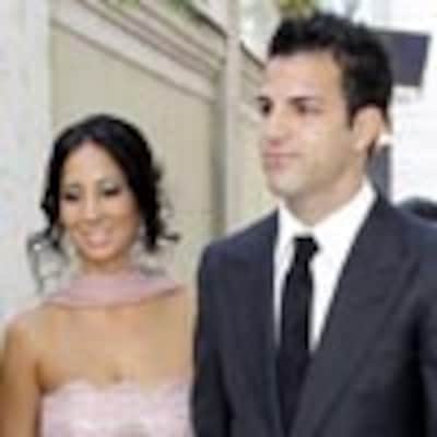 Cesc Fábregas y su novia, Carla, en la boda del futbolista brasileño Julio Baptista