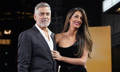 George y Amal Clooney, amor bajo la lluvia y sobre la alfombra roja en una noche muy importante para el actor