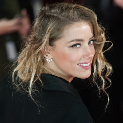 Natural de día, sexy de noche: las dos caras de Amber Heard