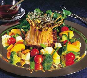 Corona de lechón con verduras primaverales