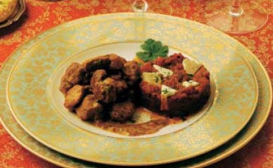 Cordero con curry y queso (Bhuna paneer khurchan)