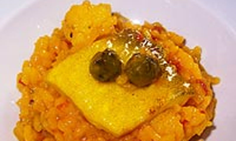 Arroz meloso de bacalao, coliflor y espinacas