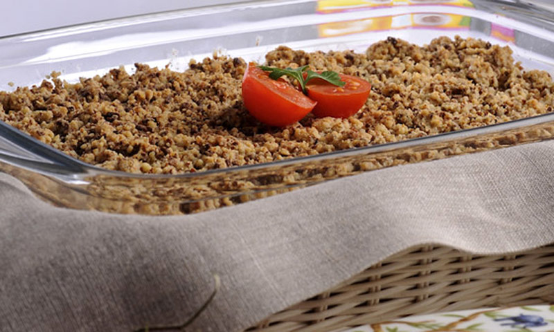 'Crumble' de tomate, queso de cabra y cereales