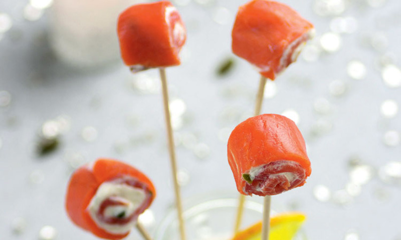 Rollitos de salmón, ricotta, mascarpone y pistachos