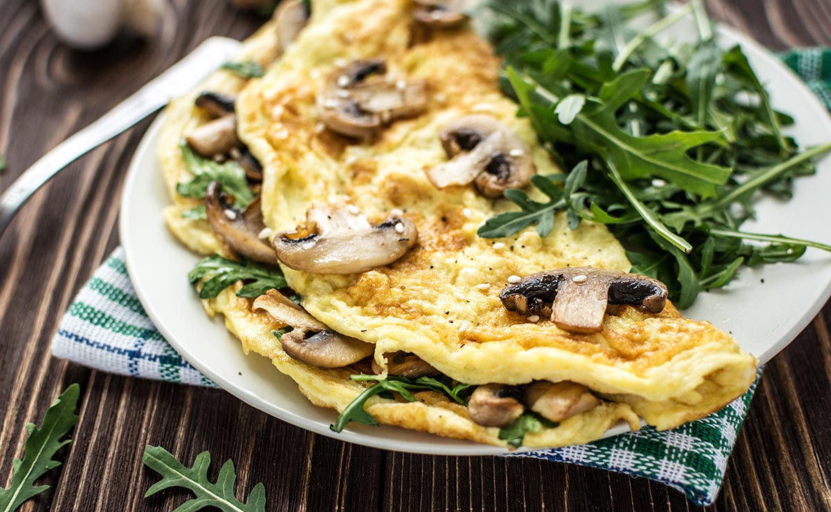 Tortilla de champiñones y rúcula