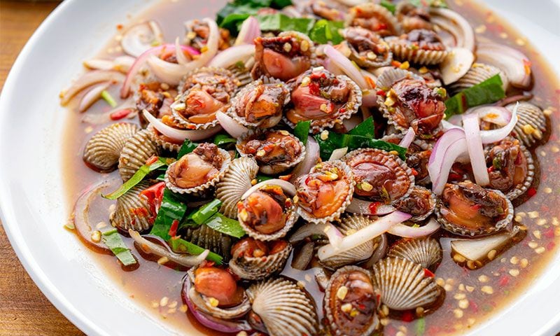 Berberechos marinados con salsa 'thai'