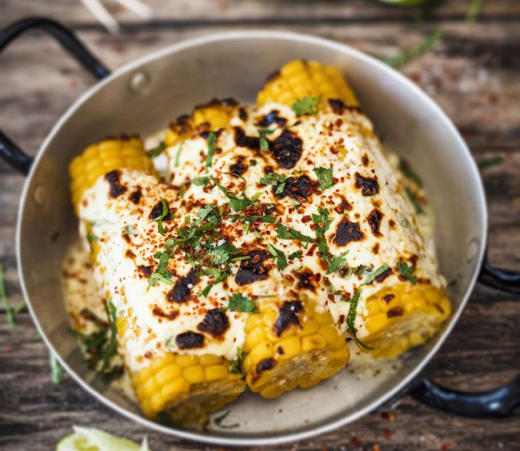 Mazorcas de maíz gratinadas con queso Mazorcas de maíz gratinadas con queso