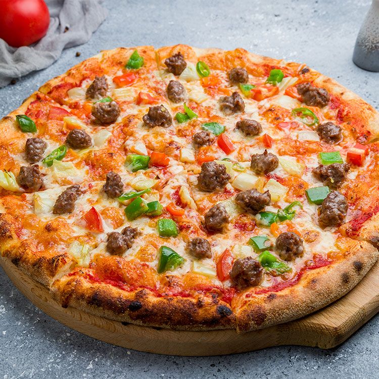 Pizza con verduras y cerdo ibérico
