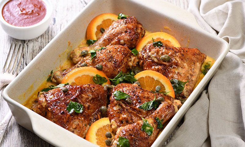 Pollo en salsa cremosa de naranja y cilantro