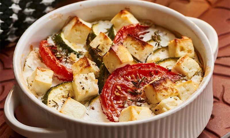 Gratinado de calabacín, tomate, queso de cabra y bulgur